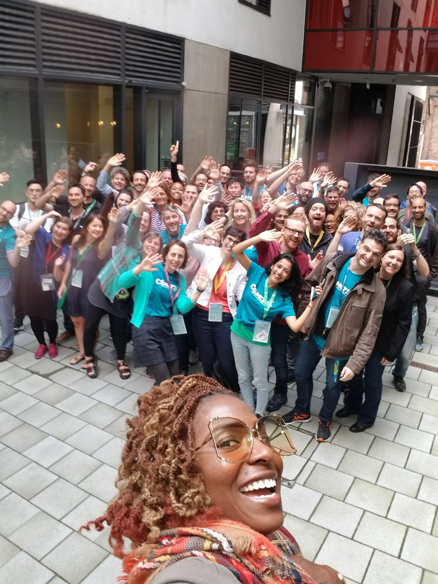 Carpentries community members in a group selfie